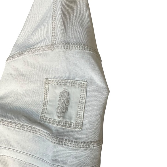 NWOT Free People Movement Post Up High V-Neck Tee Paris Medium cream and Red - Picture 9 of 11